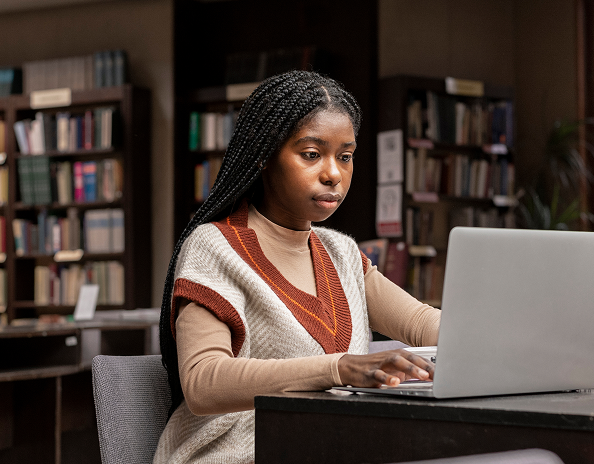 Person studying for a language test for immigration